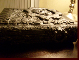 Illustration for article titled Someone's Dragon Collection Melted on this Gears of War Xbox 360
